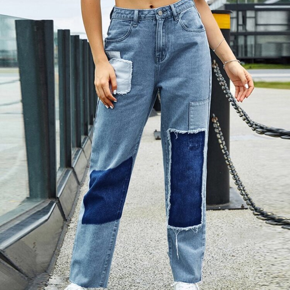 High waisted blue patched mom jeans